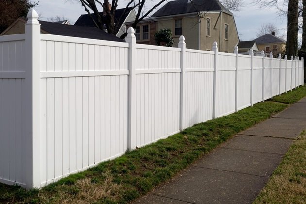PVC fence with an entrance gate, offering a welcoming and secure entry